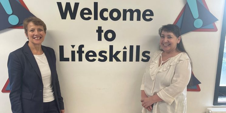PCC Clare Moody stands with Lifeskills Sam Jury Partnership Development Manager in front of a sign that reads Life skills